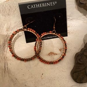 Round lightweight orange and brown bead earrings